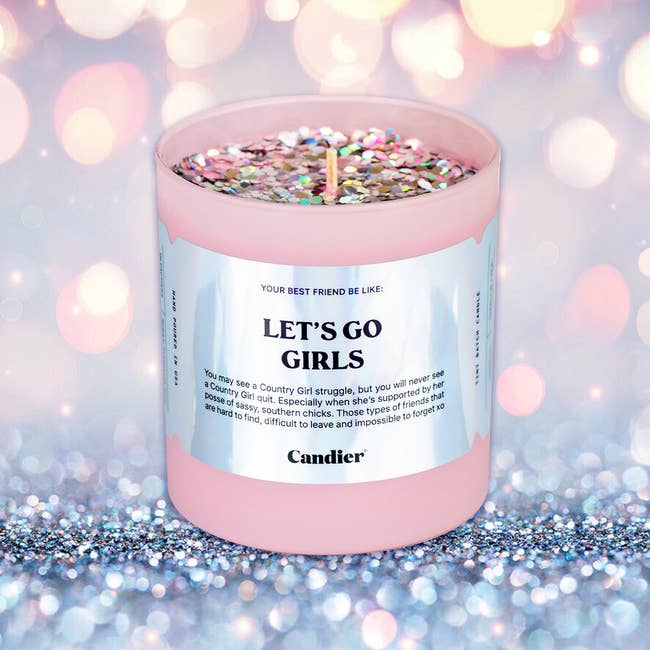 a sparkly pink candle that says 