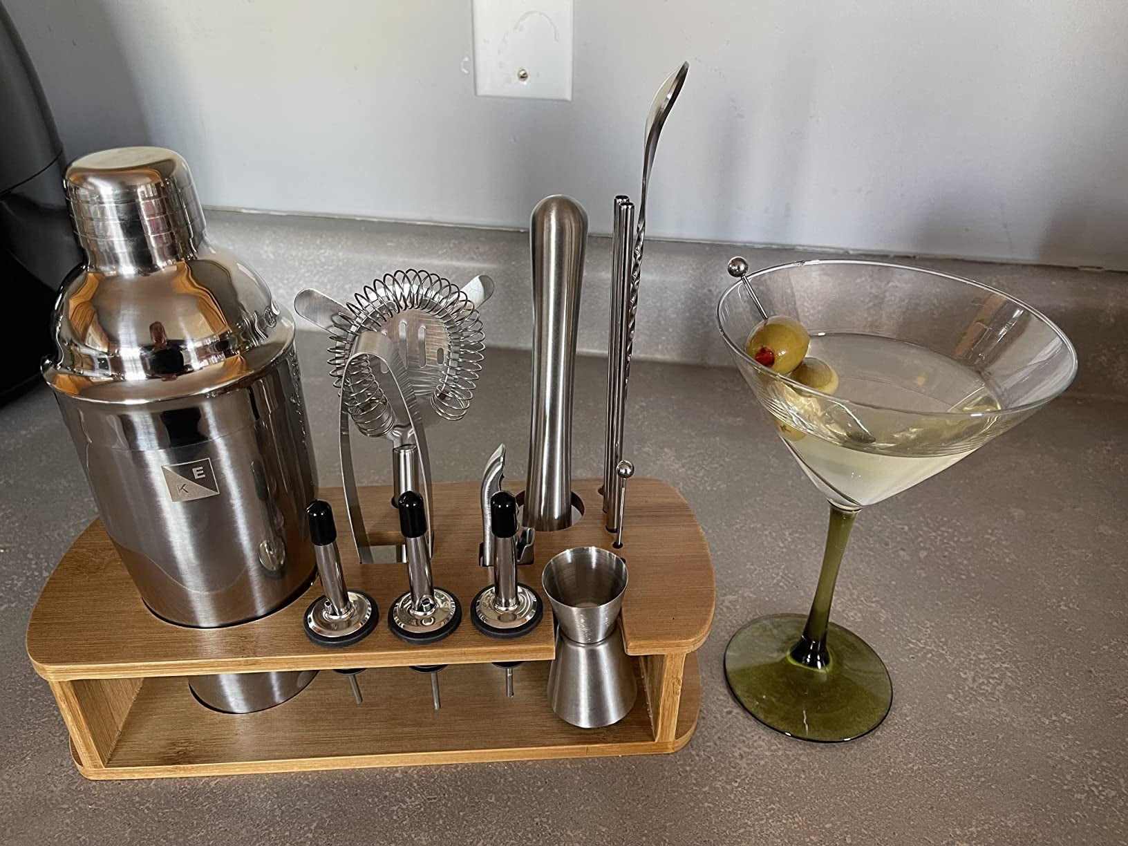 bartending set next to a martini