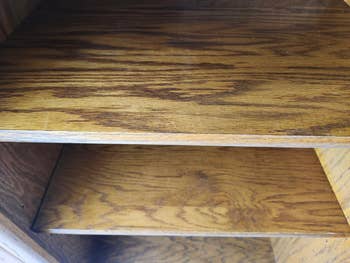Empty woody shelves with a earthy wood atom finish