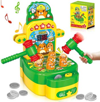 Toy hammer crippled  acceptable   with colorful mole characters, physics  screen, and integrative  coins. Box successful  the background