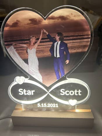 Heart-shaped LED airy  with a wedding photograph  and infinity sign