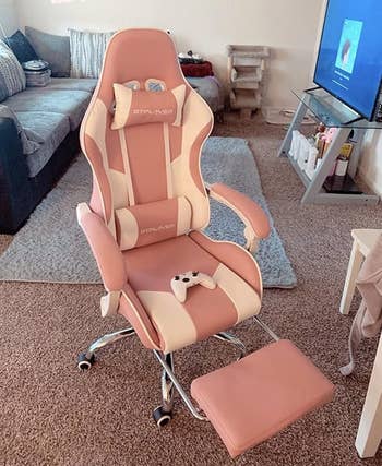 reviewer's pink chair showing the recline
