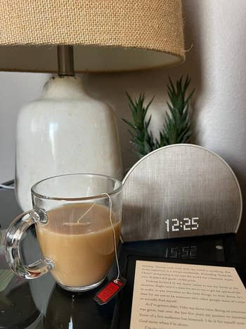 reviewer image of the alarm clock on their bedside table