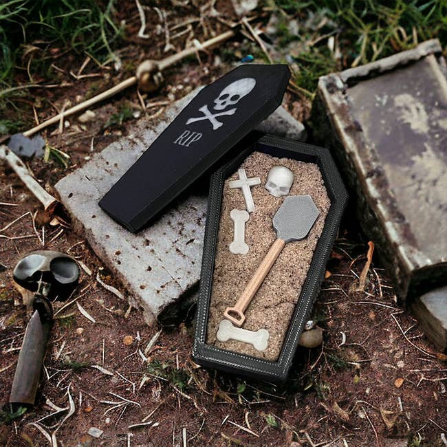 Coffin-shaped sandbox artifact  acceptable   