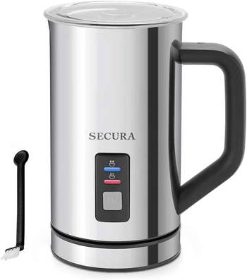 Silver and black milk steamer and frother with digital display on a white background