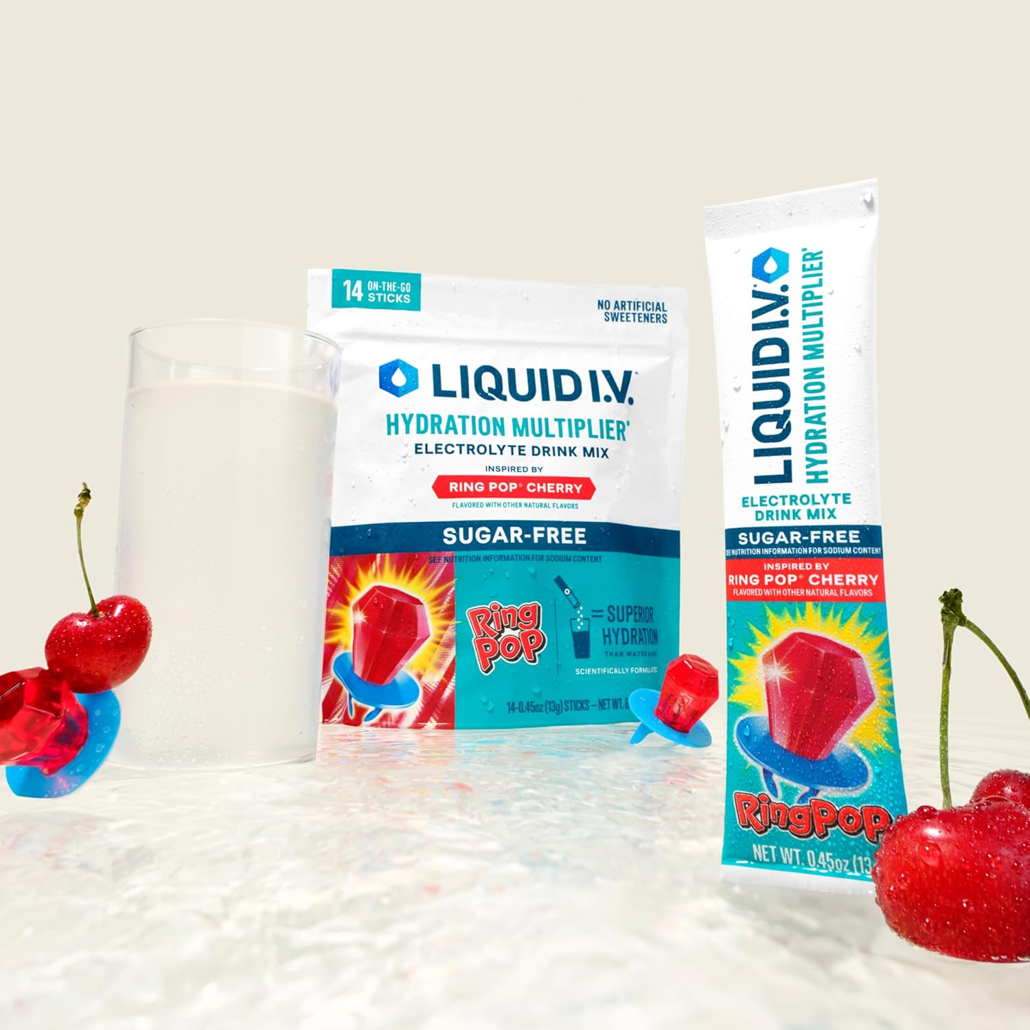 Liquid I.V. Ring Pop Cherry Hydration Multiplier electrolyte portion  premix  packets adjacent  to a solid  and Ring Pop gummies