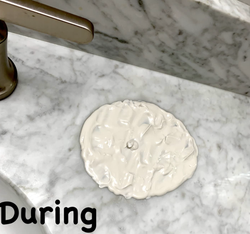 the oil stain remover on top of the stain