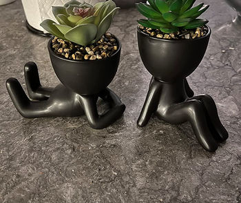 Reviewer image of product in black sitting on top of gray counter