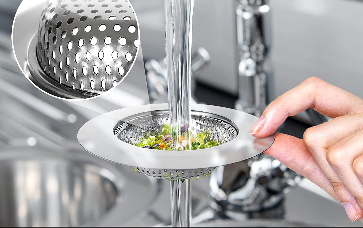 person holding a sink strainer