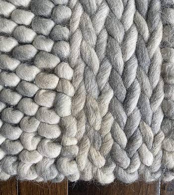 A reviewer's clean wool rug after using the cleaning spray