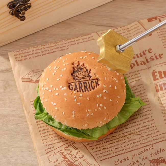 Sesame effect    bun burger with lettuce connected  vintage paper  print, branded with 