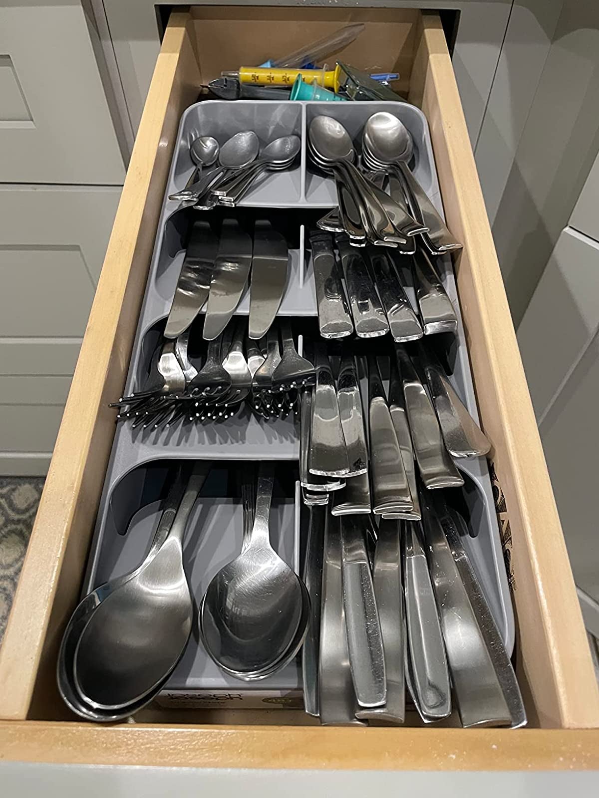 This $20 Lid Organizer Has Tamed the Chaos Inside My Kitchen Cabinets