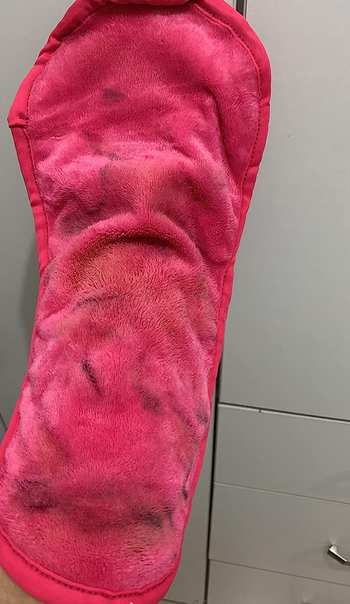 reviewer's makeup eraser full of makeup 