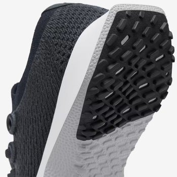 product image showing the traction on the bottom of the running shoe
