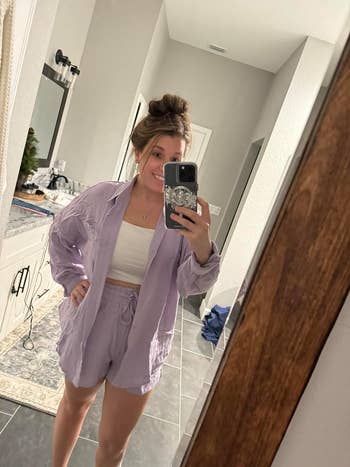 reviewer mirror selfie wearing the set in purple