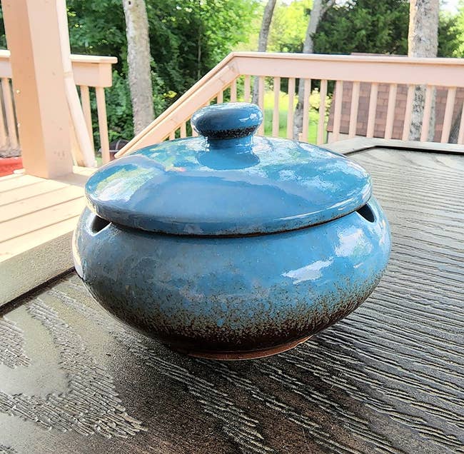 a reviewer photograph  of the ashtray successful  bluish  sitting connected  a array  extracurricular  