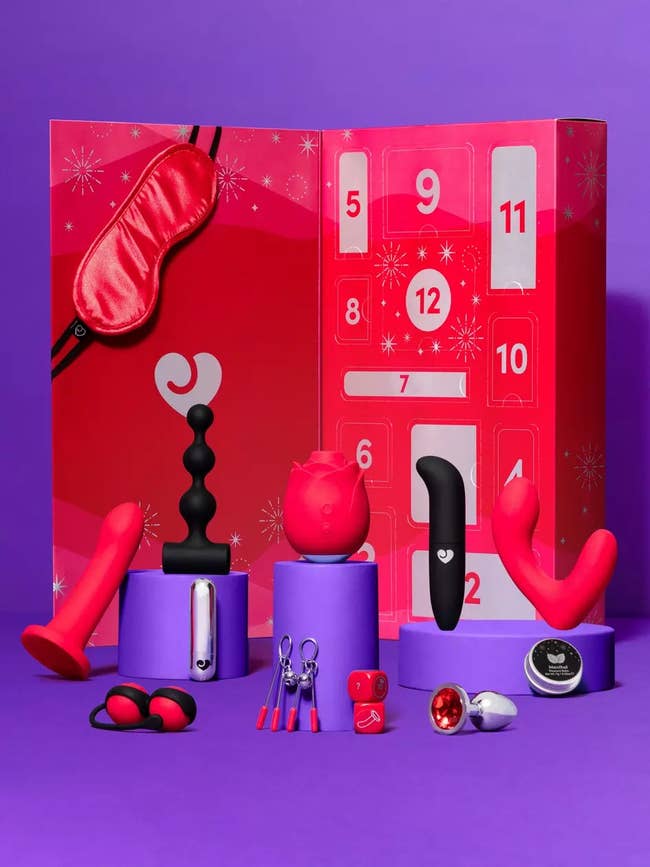 Red advent calendar with assorted sex toys and accessories on display