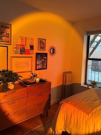 the sunset lamp casting a warm glow across a room