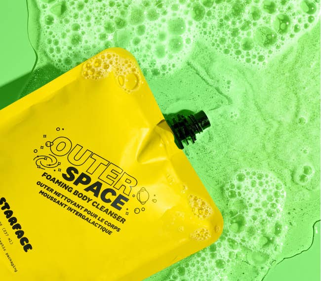 a yellow pouch of foaming body cleanser