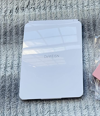 a reviewer photo of the folded mirror