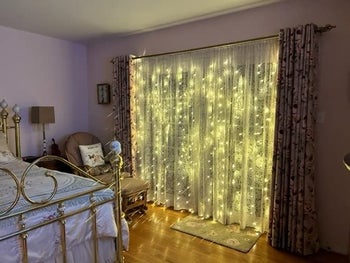 a curtain of twinkle lights