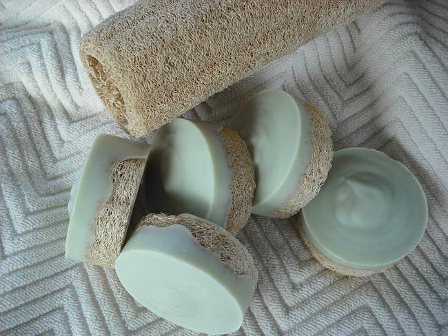 Stack of multiple loofah foot scrub's from Joan's Gardens Soap