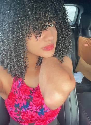 afro-latina with shiny bouncy curls