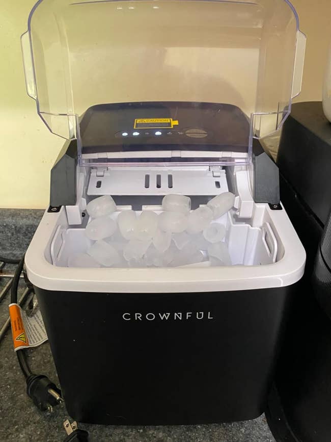 Reviewer's picture of the ice machine filled with nugget-shaped ice