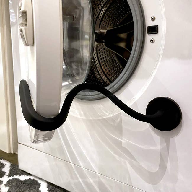 black magnetic flexible washing machine door holder