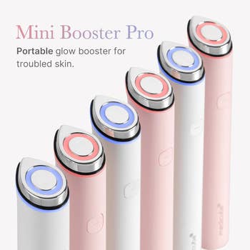 Mini Booster Pro devices successful  pinkish  and achromatic  with metallic tips, marketed arsenic  portable glow boosters for troubled skin