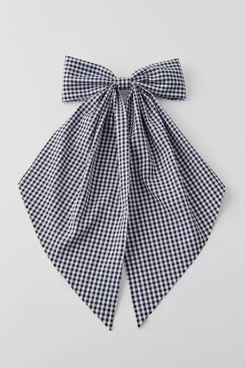 Black and white gingham pattern hair bow accessory on a plain background, featured in a shopping article