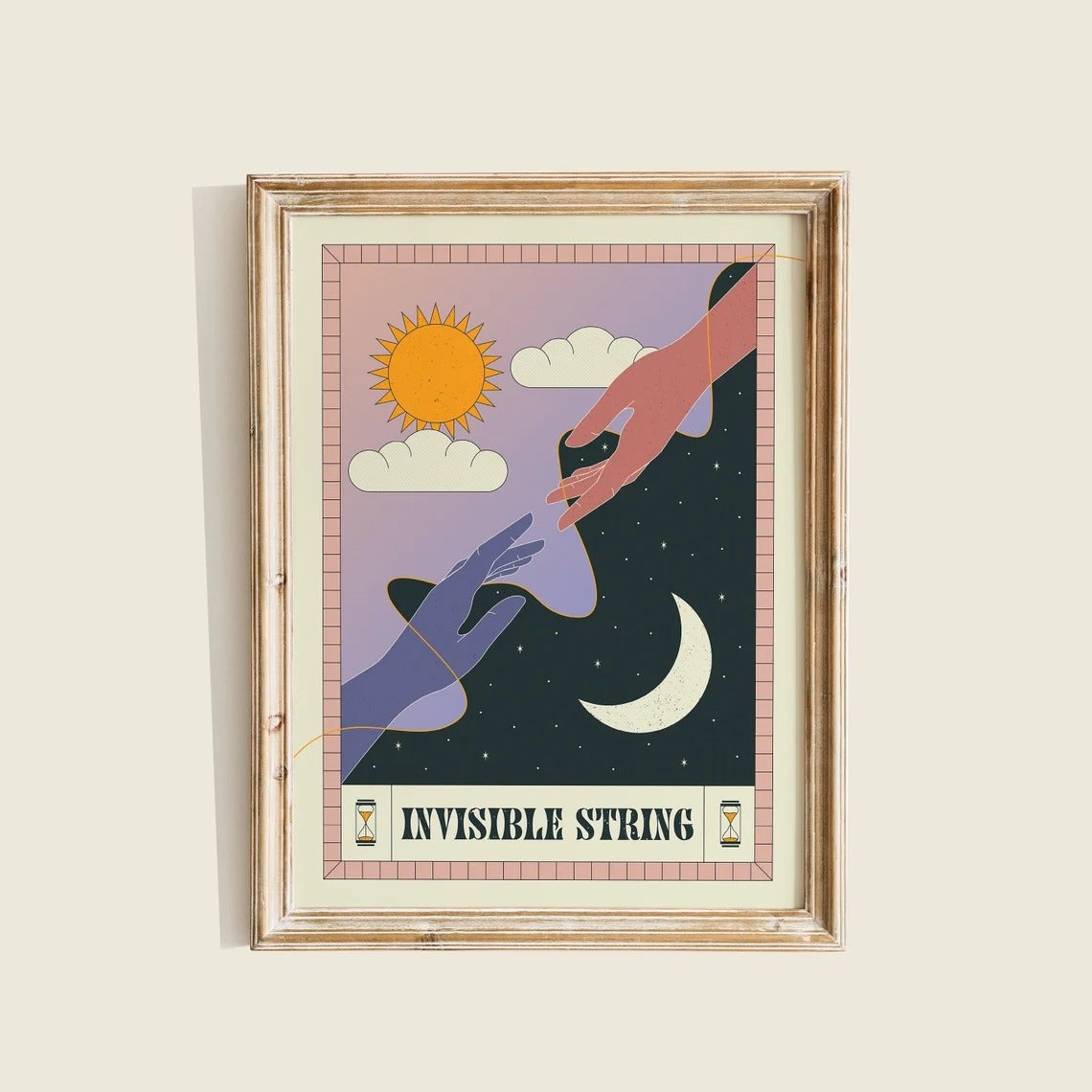 the invisible string print framed on a wall