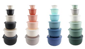 Four stacks of nesting food storage containers in various pastel tones, each with lids, arranged in different heights
