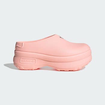 side presumption    of clog successful  pinkish  against a achromatic  background