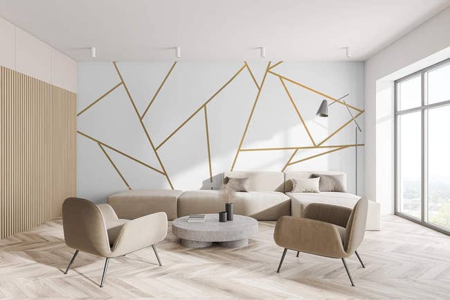 gold wall decal displayed in a living room