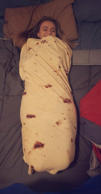 image of reviewer wrapped in the tortilla blanket