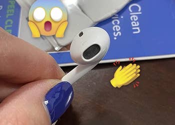 reviewer's earphone after using the putty clean
