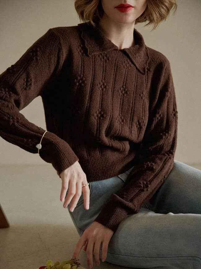 model wearing brown polo knit sweater