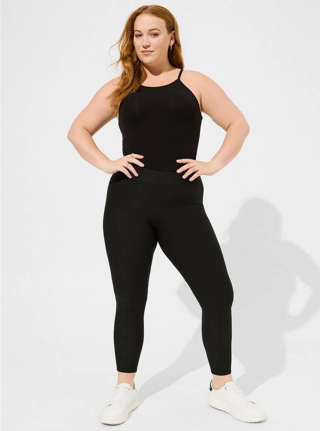 Model in black high waist leggings 