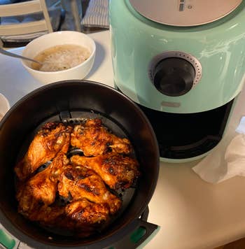 reviewer photo of wings they made using the air fryer 