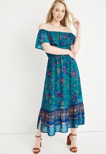 model in teal mixed floral print dress with off the shoulder ruffle neckline