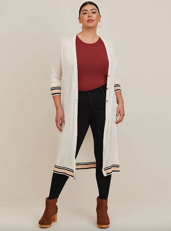 model shown from the front with the button front cardi worn open
