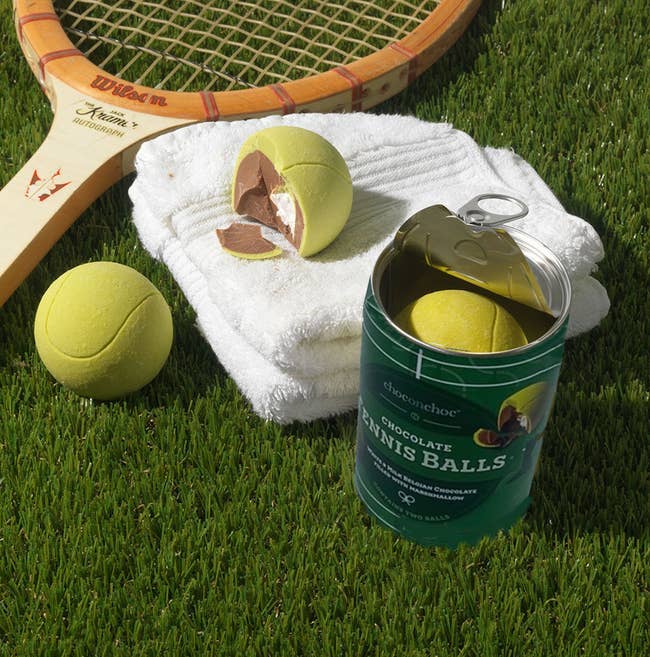 Tennis racket and chocolate-filled tennis balls. A tin labeled