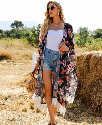 a model wearing the floral cardigan