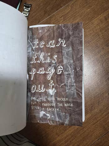 A book page instructs to tear it out, put it in your pocket, wash it, and then stick it back in. The page appears worn and crumpled