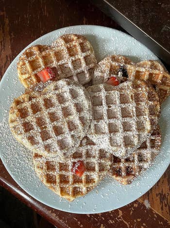 Reviewer photo of plate full of heart shaped waffles