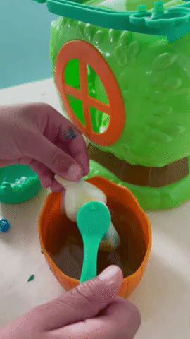 A gif showing how to scrub the figurine in the tub