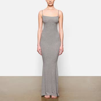 model wearing grey dress