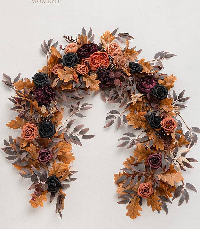 faux botanical wreath in autumnal theme 