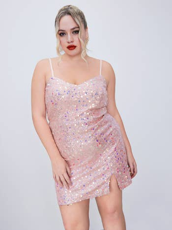 model in a sparkly pink sequined mini dress